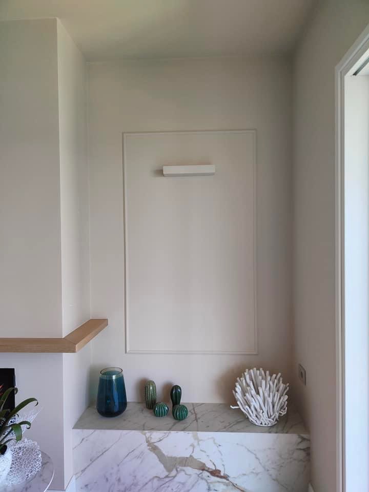 Pareti: cornici decorative e illuminazione